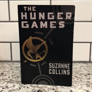 The Hunger Games by Suzanne Collins (book one)